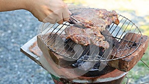 Bar-B-Q or BBQ with kebab cooking coal grill