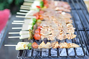 Bar-B-Q or BBQ with kebab cooking. coal grill of chicken meat sk