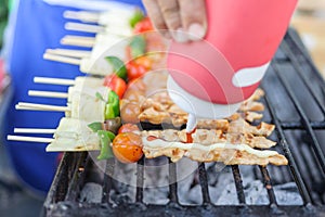 Bar-B-Q or BBQ with kebab cooking. coal grill of chicken meat sk