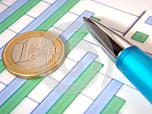 Bar chart with pen and euro coin