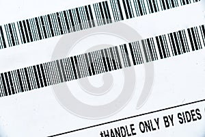 Bar code on white label on electronic device