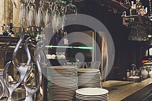 Bar counter with clean dishes close up