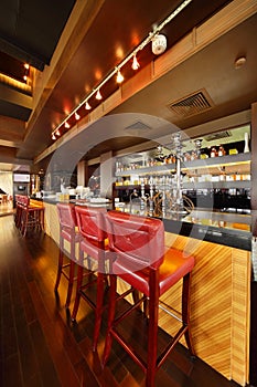 Bar counter in empty comfortable restaurant