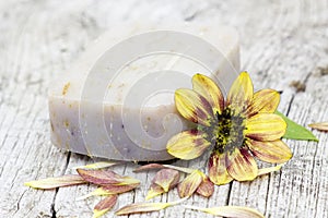 Bar of natural soap and flower