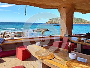 The bar restaurant and bazaar in cala comte nestled in the cliff rock