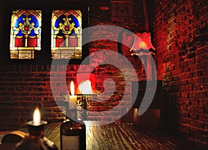 Bar scene, lustres in red and glass stained window