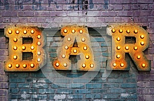 Bar signboard. Inscription from large metal letters