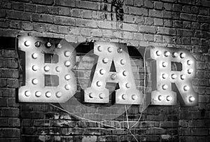 Bar signboard. Inscription from large metal letters