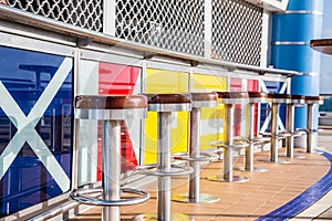 Bar Stools on Colorful Cruise Ship Deck