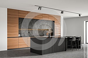 Bar with stools in white kitchen corner