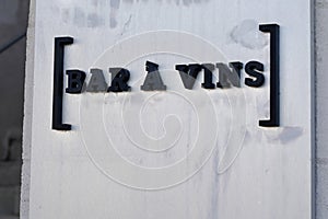 Bar a vins french text on wall pub facade means wine bar france photo