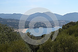 Baracci beach and the town of Propriano in Corsica