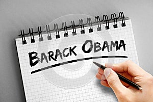 Barack Obama text on notepad, concept background photo