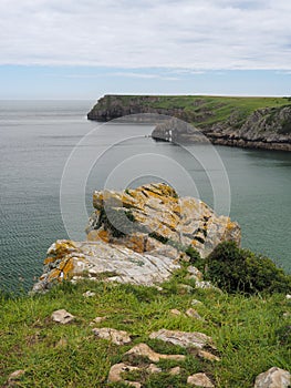 Barafundle Bay looking out to natural sea arches, Stackpole, Pembrokeshire Wales photo