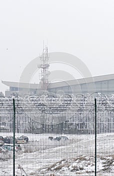 Barb wire fence at the cold winter day