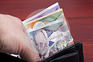 Barbadian dollar in the black wallet