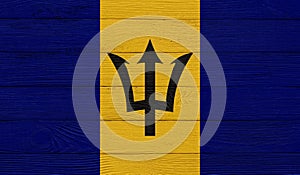 Barbados flag on a wooden texture