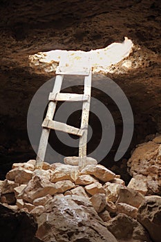 Barbaria cape cave hole aged wood steps photo