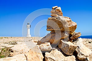 Barbaria formentera Lighthouse make a wish stones photo