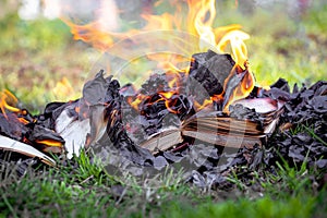 Barbaric burning of books, destruction of books on fire