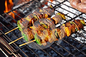 Barbecue beef kebabs on grill