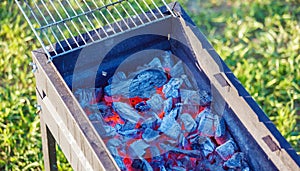 Barbecue Charcoals with Red Glow and Fire