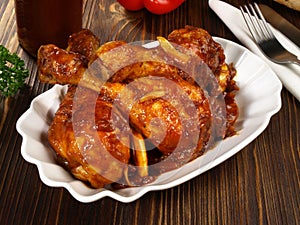 Fine Meat - Barbecue - Chicken Legs on wooden Background