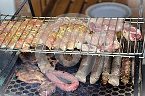 Barbecue with chicken, pork, kafta and sausage photo