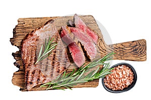 Barbecue dry aged wagyu Flank Steak on a cutting board. Isolated, white background.