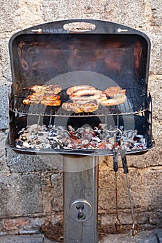 Barbecue with filet steak meat on a charcoal grill. Grilled food concept