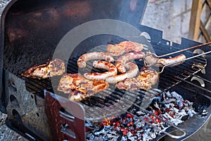 Barbecue with filet steak meat on a charcoal grill. Grilled food concept