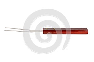 Barbecue fork isolated on white background. Stainless steel grill fork with wooden handle. Close up