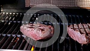 barbecue fresh beef meat with blood steak serving delicious food dinner lunch pierce with skewer moving live practically