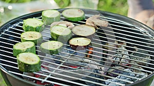 Barbecue Grill. Grilling Marrows and Mushrooms