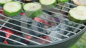 Barbecue Grill. Grilling Marrows and Mushrooms