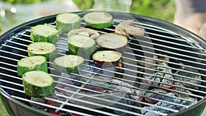 Barbecue Grill. Grilling Marrows and Mushrooms