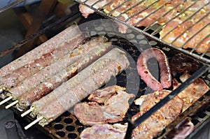 Barbecue grill with kafta, sausages, pork and chicken photo
