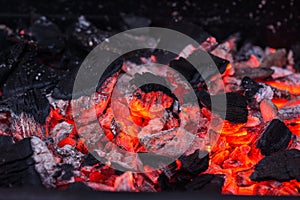 Barbecue Grill Pit With Glowing And Flaming Hot Charcoal