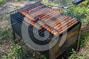 Barbecue grill sausages close up.