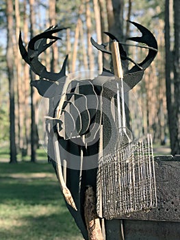 A barbecue grill in the shape of deer antlers