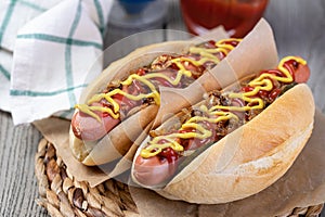 Barbecue Grilled Hot Dog with Yellow Mustard and ketchup