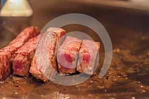 Barbecue Kobe steak, Selected focus on a dry aged Wagyu entrecote steak on hot plate