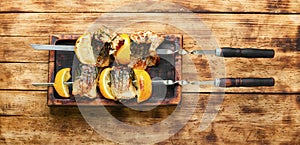 Barbecue mackerel fish on skewers