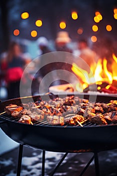 Barbecue party outdoors in winter