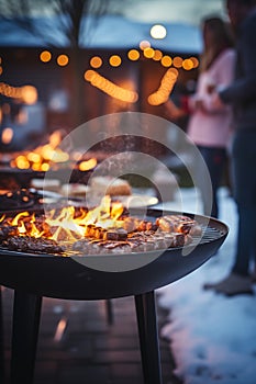 Barbecue party outdoors in winter