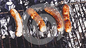 Barbecue with pork belly, meat and sausages