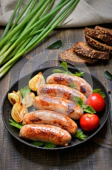 Barbecue sausages in frying pan