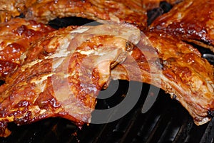 Barbecue spare ribs on a grill