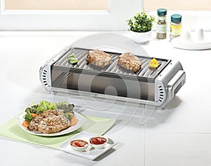 Barbecue stove in the kitchen interior