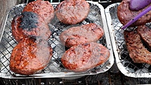 Barbecue in a Uk garden in bright summer weather.